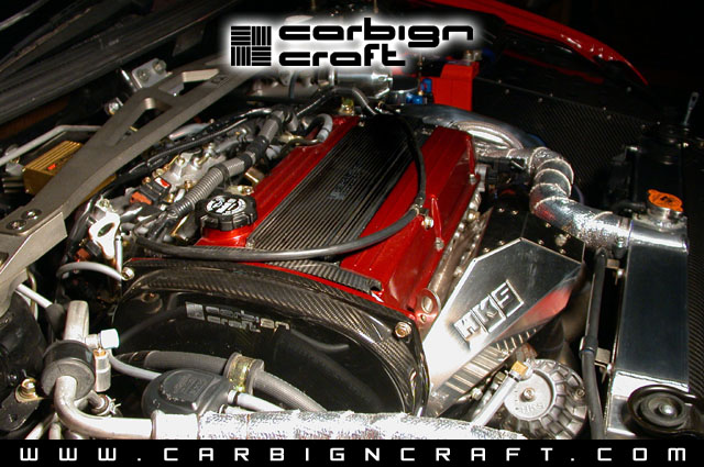 Carbon Fiber Cam Gear Cover: Lancer Evolution VIII